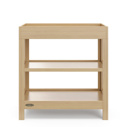 Graco Teddi Changing Table with Water-Resistant Changing Pad (Driftwood) - GREENGUARD Gold Certified, 2 Open Shelves, Includes Bonus Water-Resistant Changing Pad with Safety Strap Graco