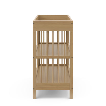 Graco Teddi Changing Table with Water-Resistant Changing Pad (Driftwood) - GREENGUARD Gold Certified, 2 Open Shelves, Includes Bonus Water-Resistant Changing Pad with Safety Strap Graco