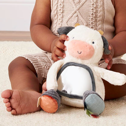 Itzy Ritzy Sensory Tummy Time Toy Mirror - Features Crinkle & Jingle Sounds, Multiple Textures and Mirror for Self-Discovery, Infant Toy For Ages 0 Months and Up, Cow Itzy Ritzy