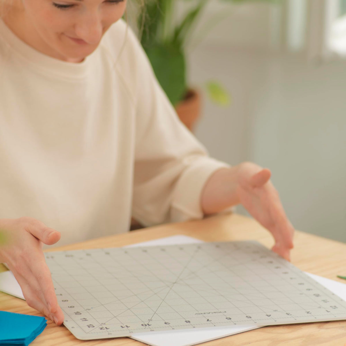 Fiskars 14" x 14" Rotating Self Healing Cutting Mat for Fabric Squares