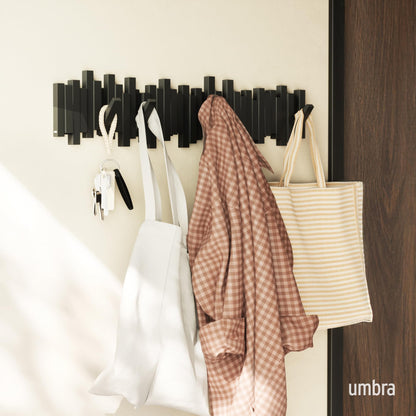 Umbra Sticks Wall-Mounted Coat Rack Rail Hook with 8 Retractable Pegs – Modern, Space-Saving Storage Organizer, Black Umbra