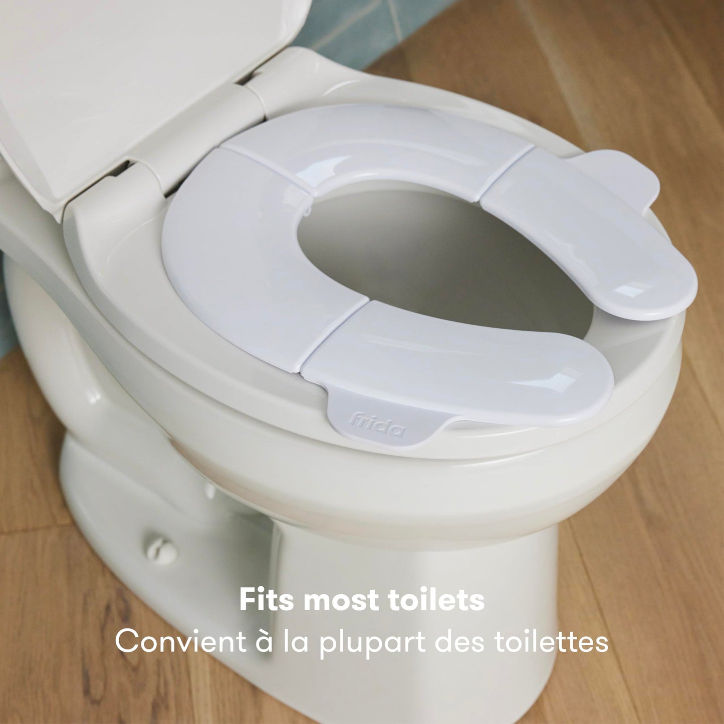 Frida Baby Fold-and-Go Potty Seat for Toilet, Foldable Travel Potty Seat for Toddler, Fits Round & Oval Toilets, Non-Slip Base, Handles, Includes Free Travel Bag - Available at All In One Marketplace Canada