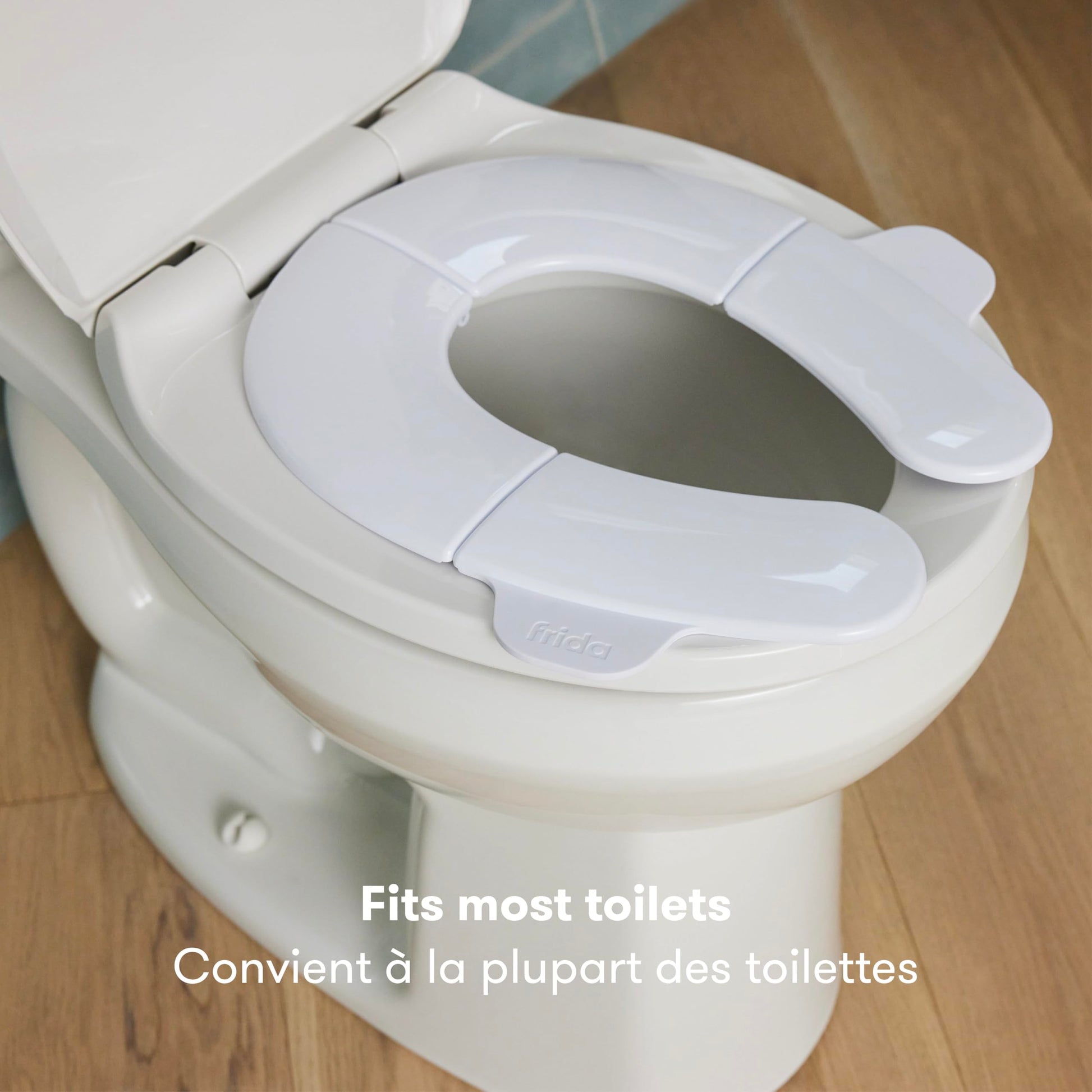 Frida Baby Fold-and-Go Potty Seat for Toilet, Foldable Travel Potty Seat for Toddler, Fits Round & Oval Toilets, Non-Slip Base, Handles, Includes Free Travel Bag - Available at All In One Marketplace Canada