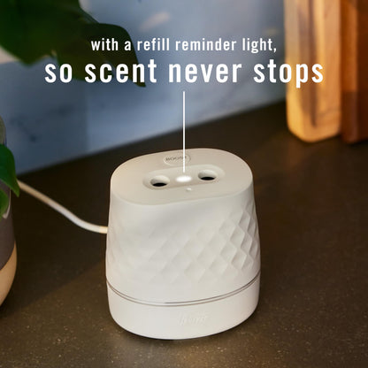 Febreze PLUG Scent Booster Starter Kit, White, Oil Diffuser, Air Freshener Plug In, Continuous Scent Device + 1 Gain Original Refill