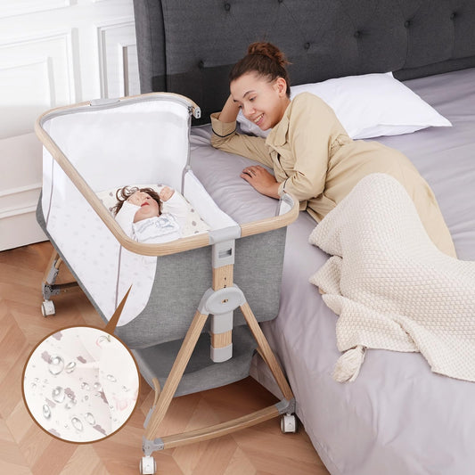 Baby Bassinet Bedside Sleeper - 3 in 1 Bassinets with Waterproof Sheets, Soft Mattress and Breathable Mesh, Adjustable Height Bedside Bassinet for Baby with Wheels, Storage Basket, Gray