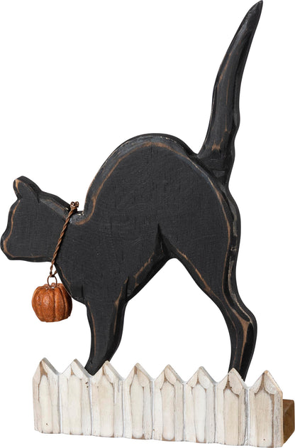 Décoration de maison pour Halloween Primitives by Kathy représentant un chat noir sur une clôture