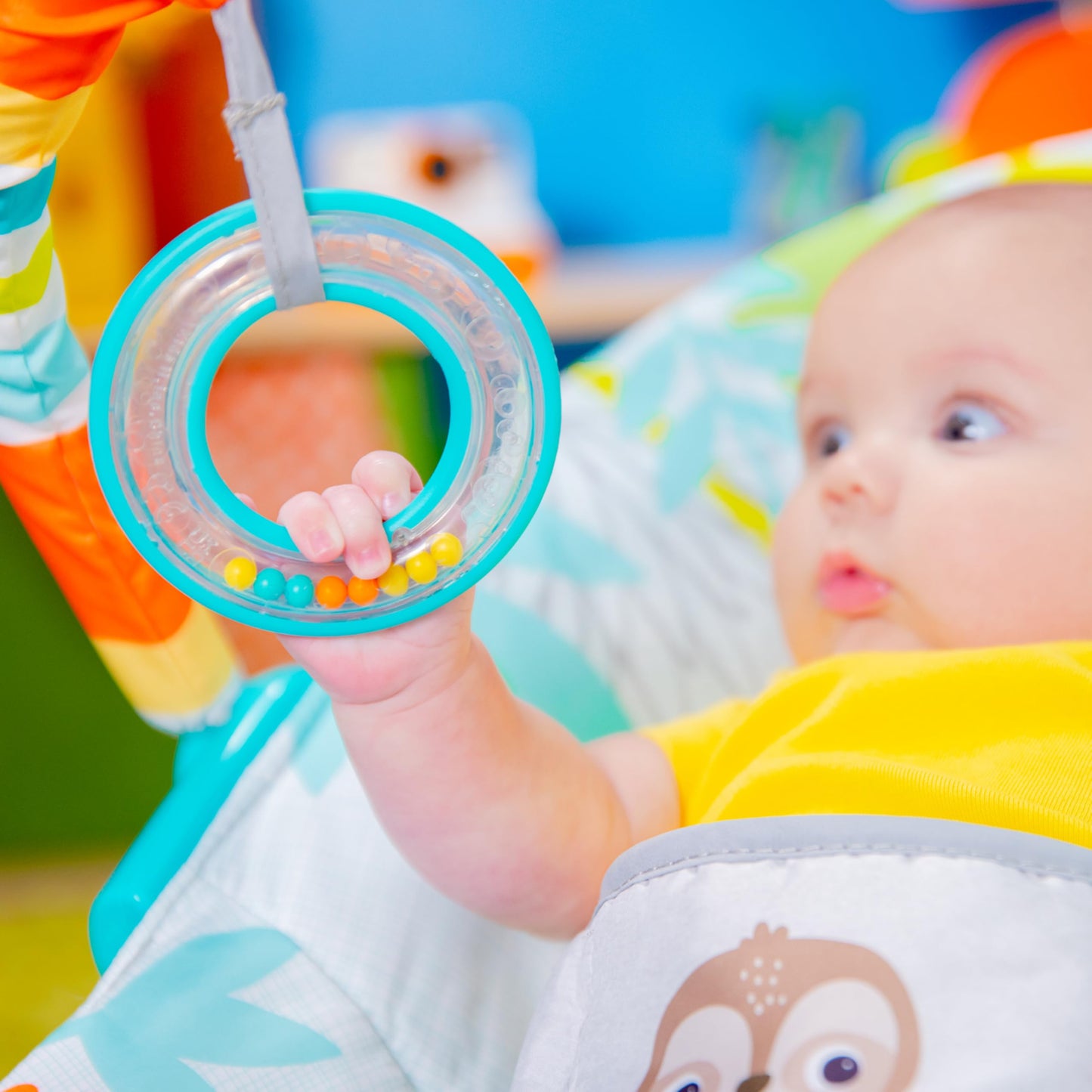 Bright Starts Rainforest Vibes 3-Point Harness Vibrating Baby Bouncer with -Toy bar