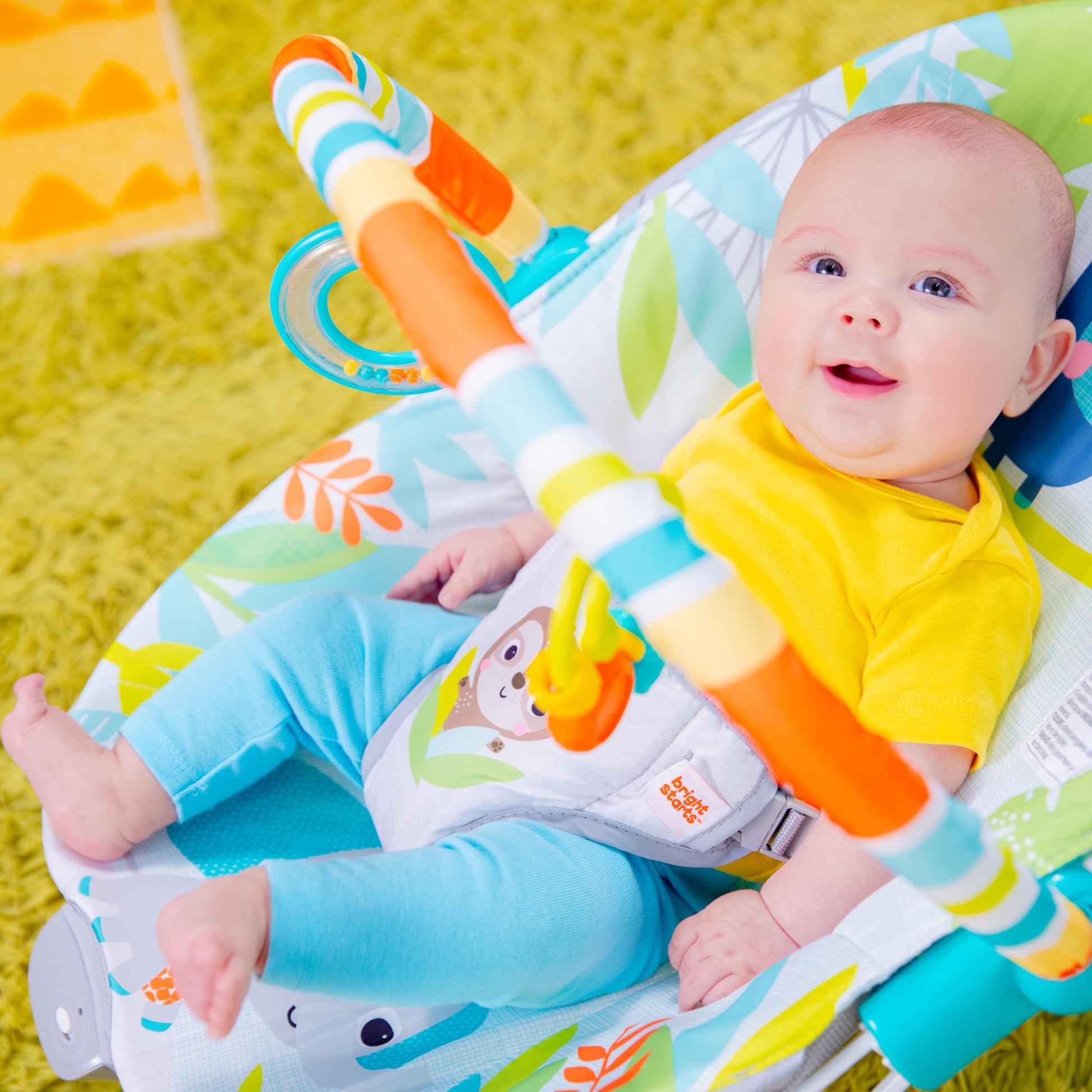 Bright Starts Rainforest Vibes 3-Point Harness Vibrating Baby Bouncer with -Toy bar