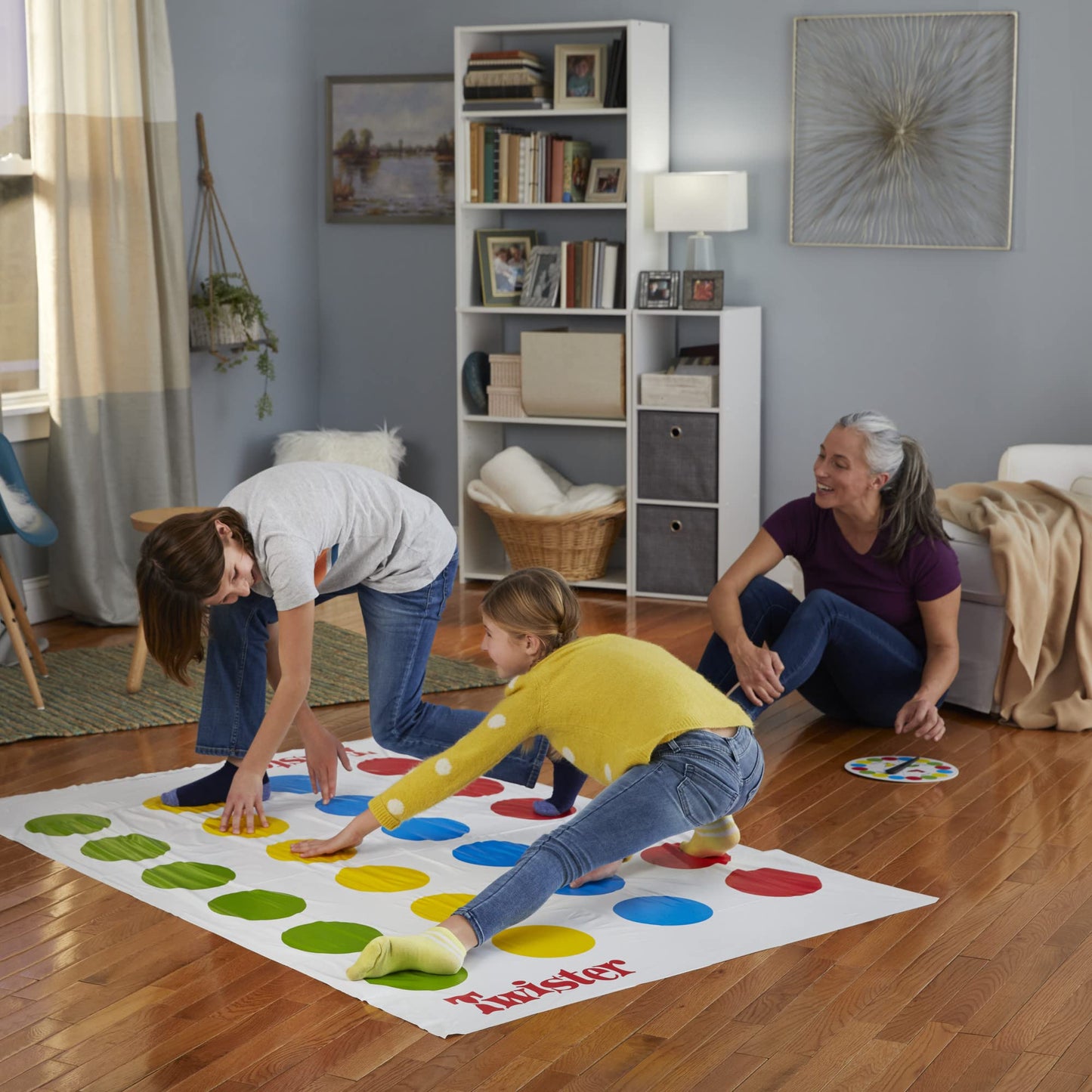 Hasbro Twister Game, Party Game, Classic Board Game for 2 or More Players, Indoor and Outdoor Game for Kids 6 and Up, English and French Bilingual Version
