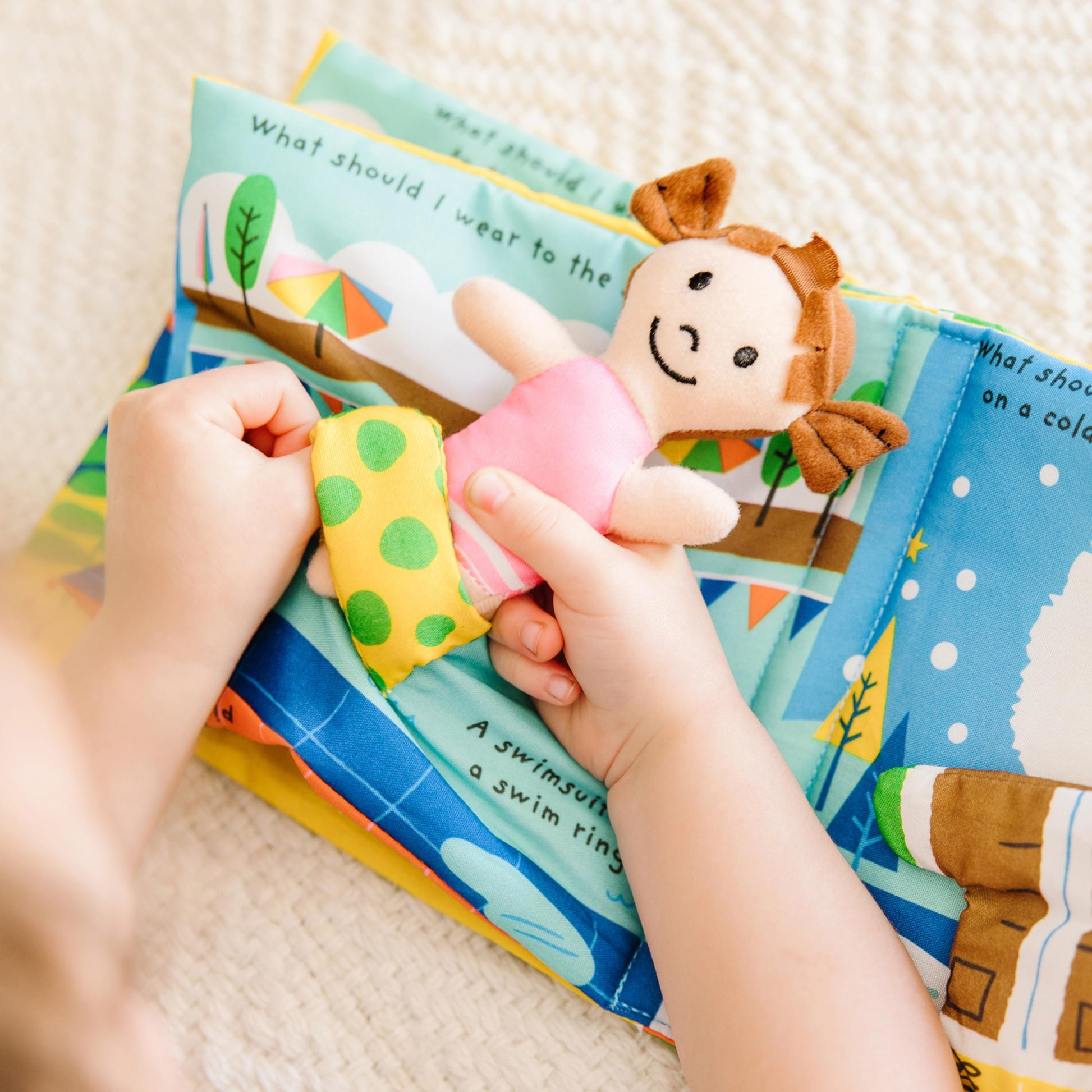 Melissa & Doug Soft Activity Baby Book - What Should I Wear?Sensory Toys for Toddlers, Travel Toys for Toddlers, Dress Up Doll for Babies and Melissa & Doug
