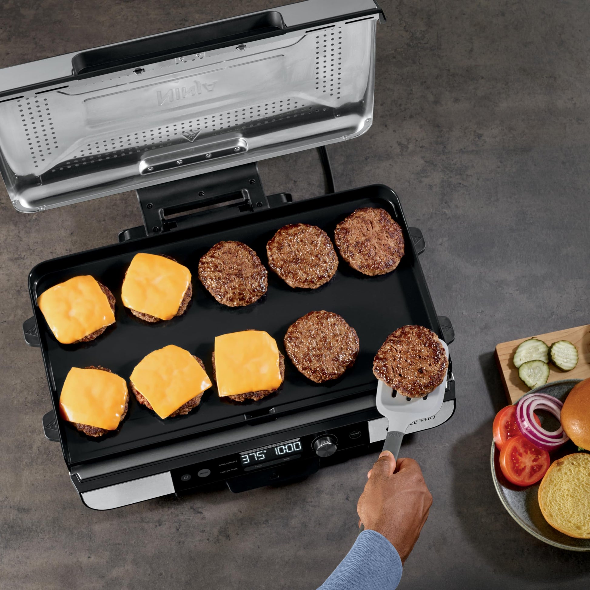Ninja Sizzle Pro XL 20-Inch Indoor Griddle + Grill, Detachable Ventilated Lid, Grease Control, Ceramic Nonstick Plates, Even Edge-to-Edge Cooking, Extra Large Capacity, Versatile, Silver, GX101C - Available at All In One Marketplace Canada