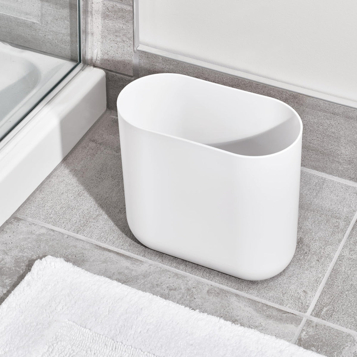 iDesign Cade Oval Slim Trash Can, Compact Waste Basket Garbage Can for Bathroom, Bedroom, Home Office, Dorm, College - Matte White/Gray