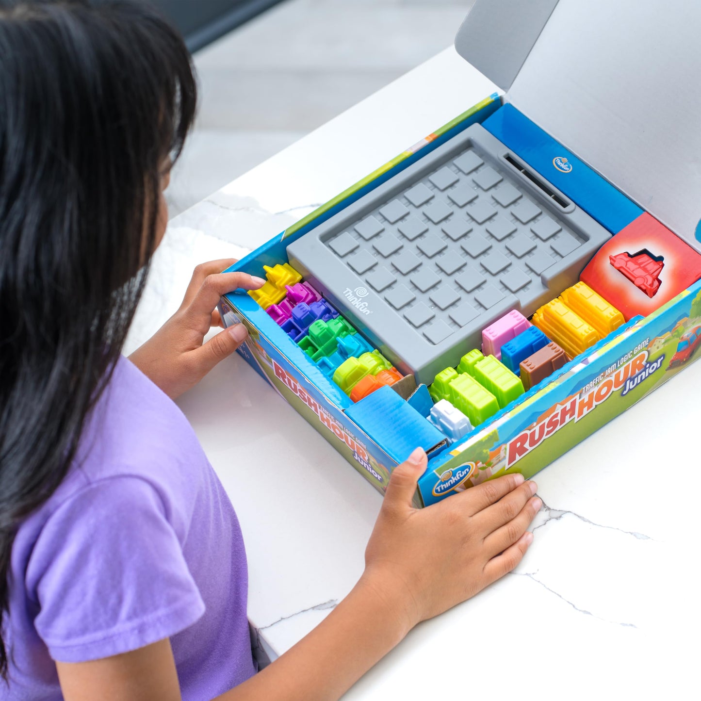 ThinkFun Rush Hour Junior - Classic Traffic Jam Logic Game | New Look for 2024 | STEM Toy for Kids | Engaging Puzzles for Ages 5 and Up | Junior Edition of the International ThinkFun