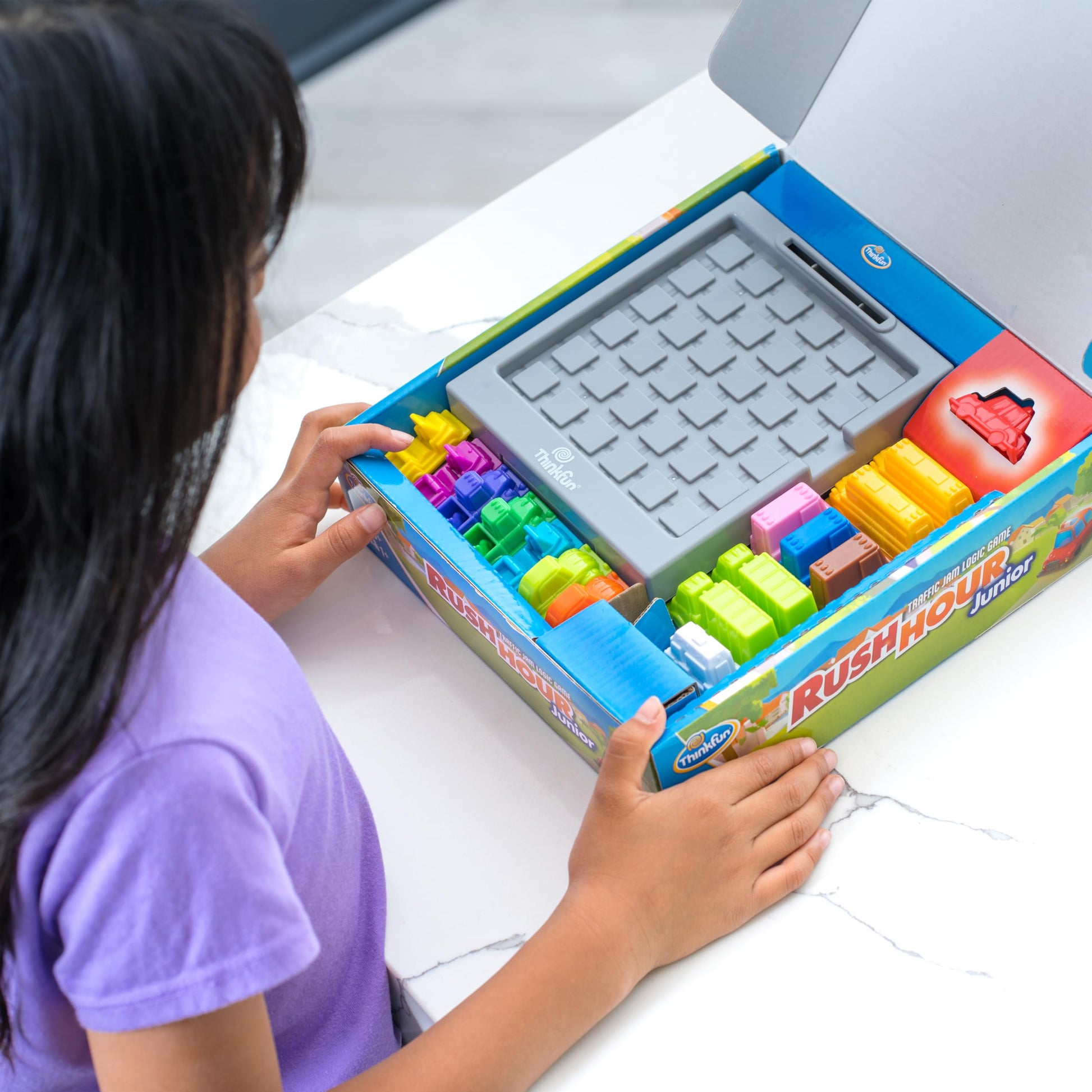ThinkFun Rush Hour Junior - Classic Traffic Jam Logic Game | New Look for 2024 | STEM Toy for Kids | Engaging Puzzles for Ages 5 and Up | Junior Edition of the International ThinkFun