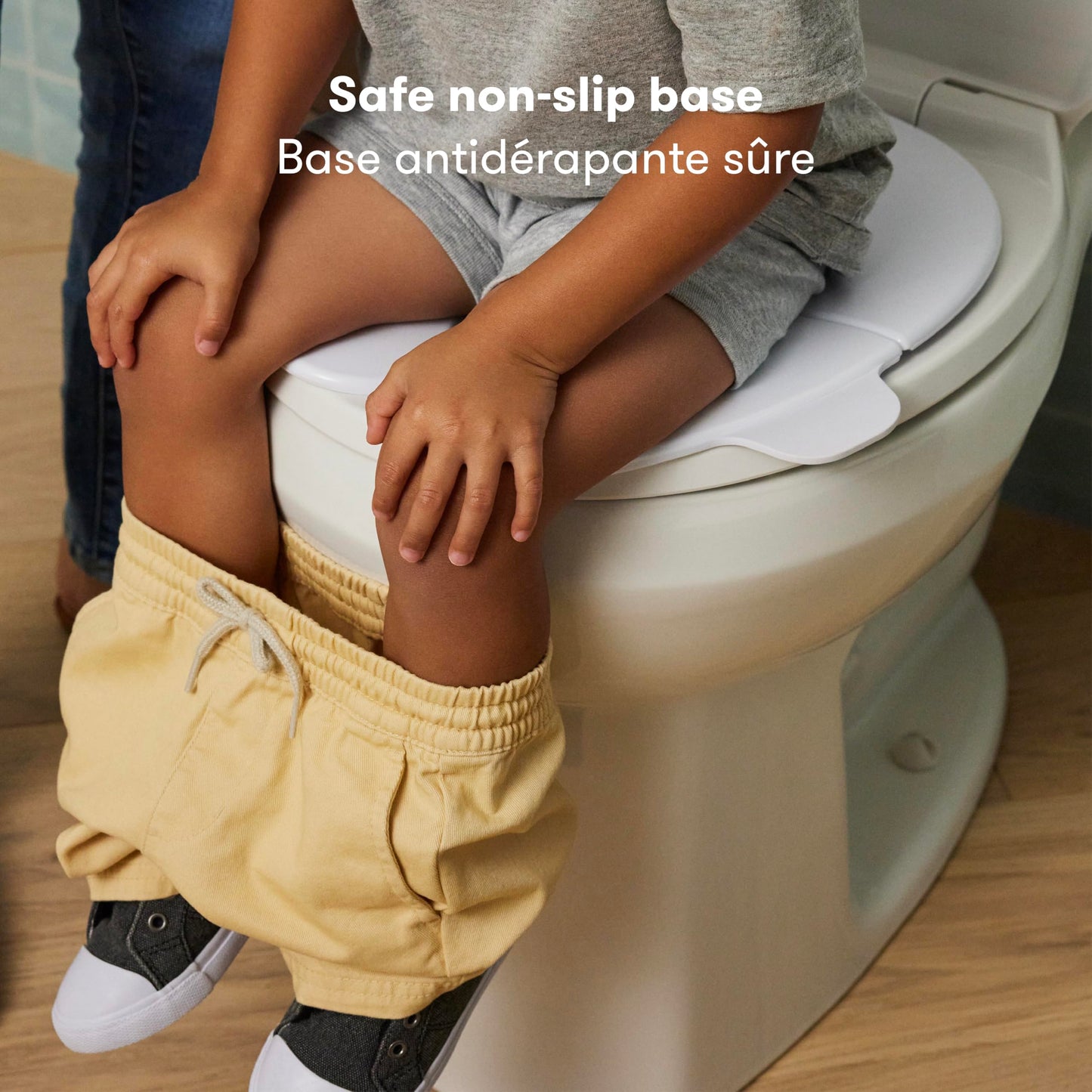 Frida Baby Fold-and-Go Potty Seat for Toilet, Foldable Travel Potty Seat for Toddler, Fits Round & Oval Toilets, Non-Slip Base, Handles, Includes Free Travel Bag - Available at All In One Marketplace Canada