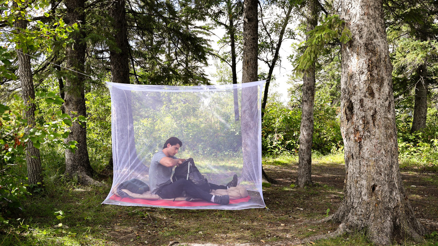 Coghlan's Rectangular Mosquito Net – Lightweight Mesh Canopy for Camping, Travel, and Outdoor Use – Includes Tie Loops, Carry Bag, Twine, Hooks, Anchors, Nails – White, 78" x 32" x 59" Coghlan's