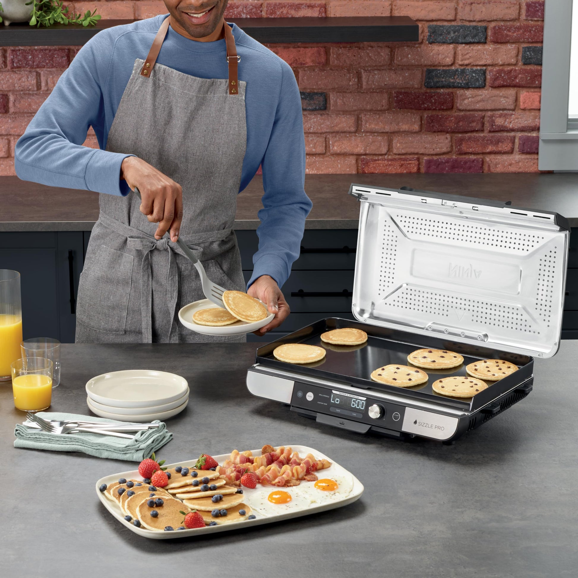 Ninja Sizzle Pro XL 20-Inch Indoor Griddle + Grill, Detachable Ventilated Lid, Grease Control, Ceramic Nonstick Plates, Even Edge-to-Edge Cooking, Extra Large Capacity, Versatile, Silver, GX101C - Available at All In One Marketplace Canada